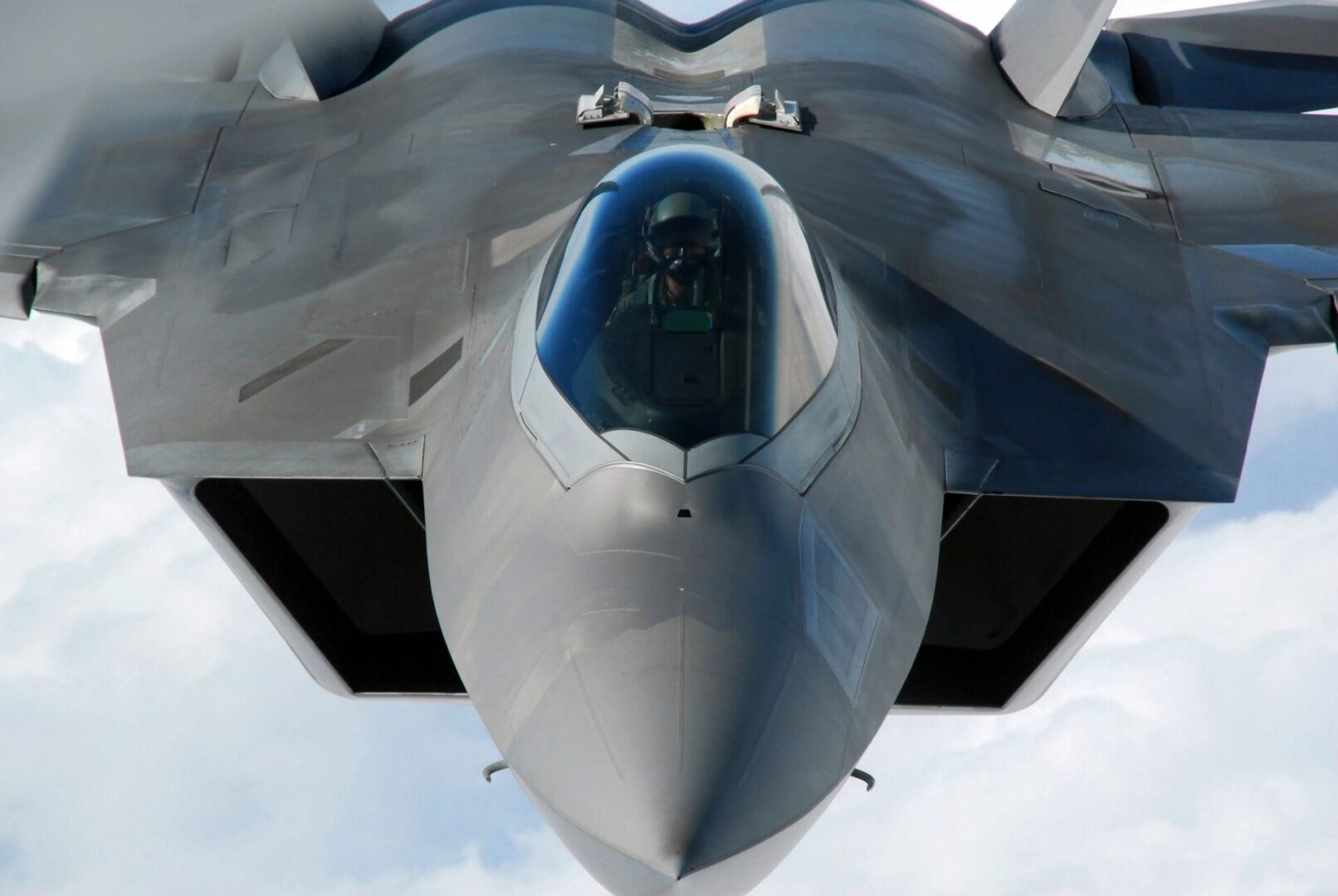 A fighter jet flying through the sky.